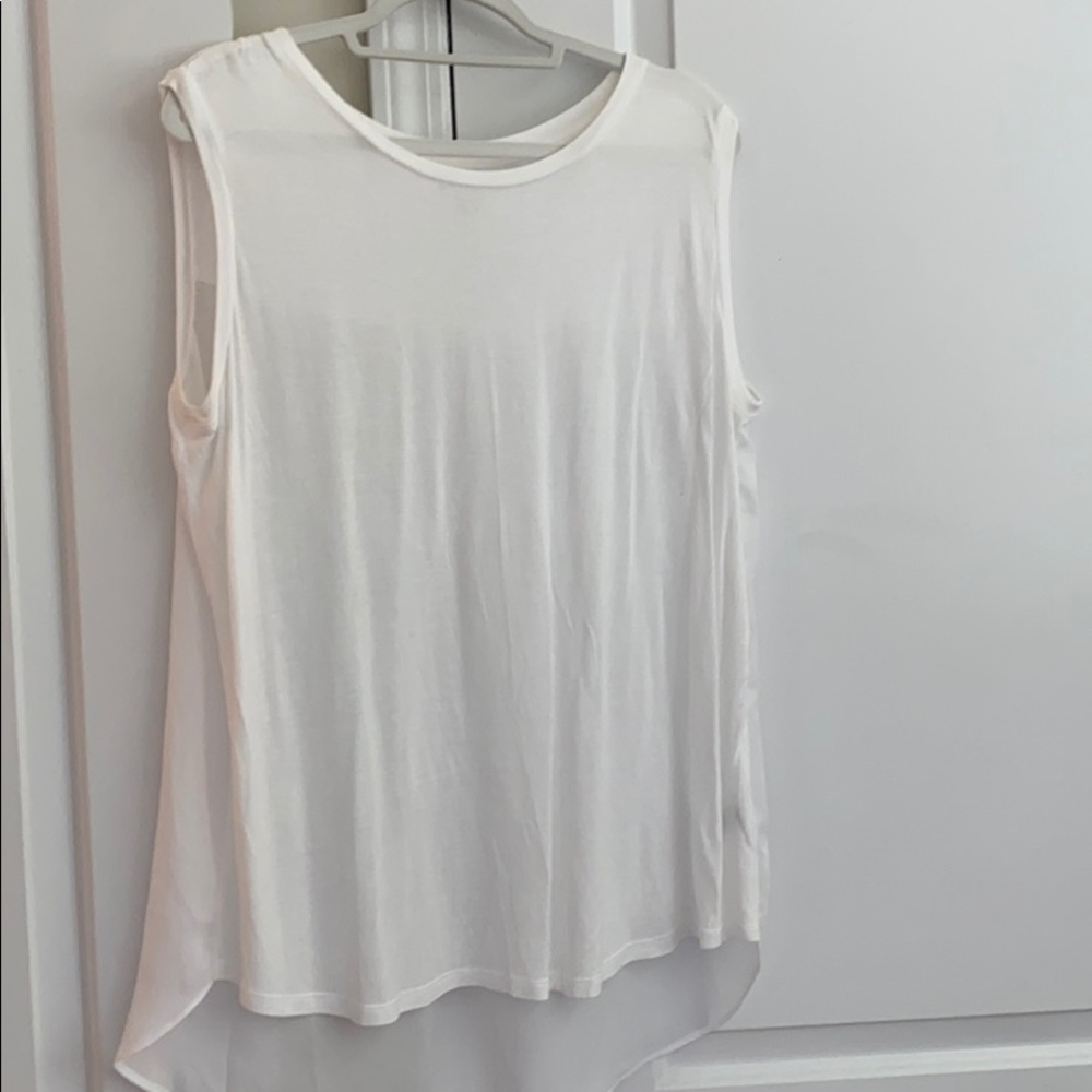 Sleeveless semi sheer white blouse